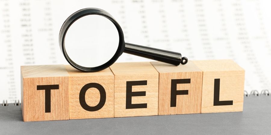 Examen TOEFL iBts Escuela ELA, Bloques de madera formando las siglas TOEFL